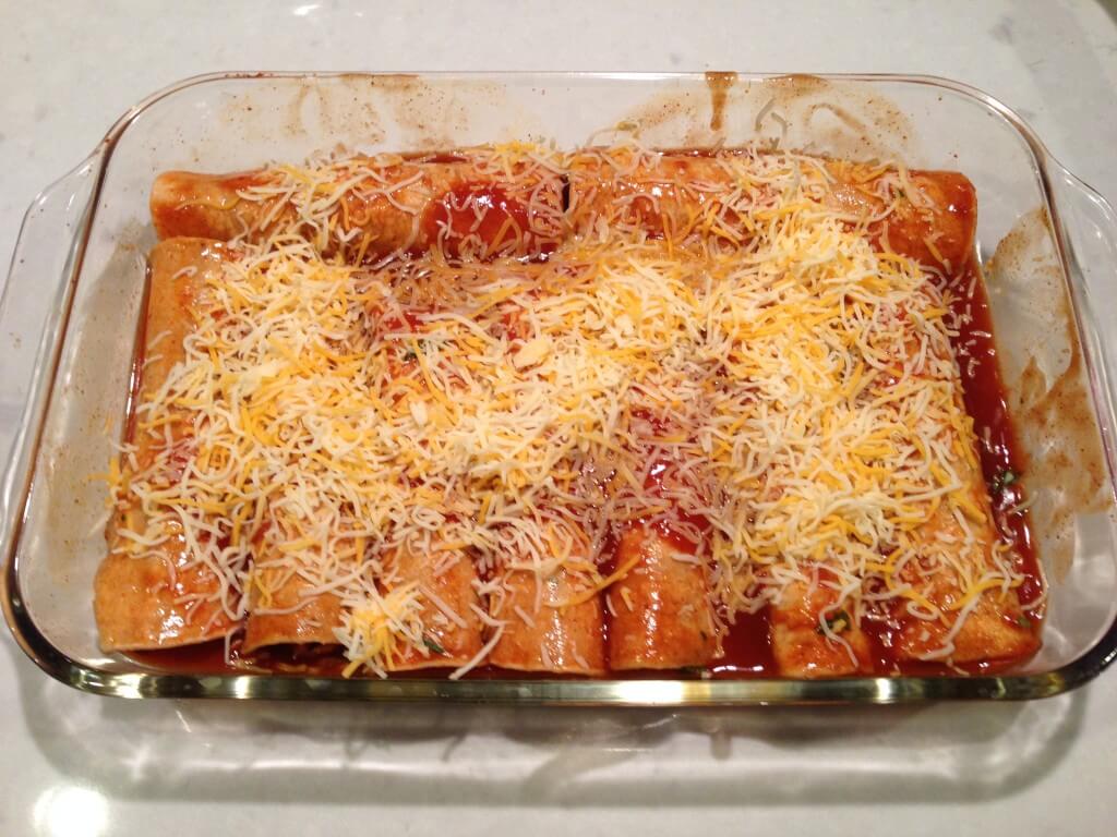 Prepared enchiladas before baking.